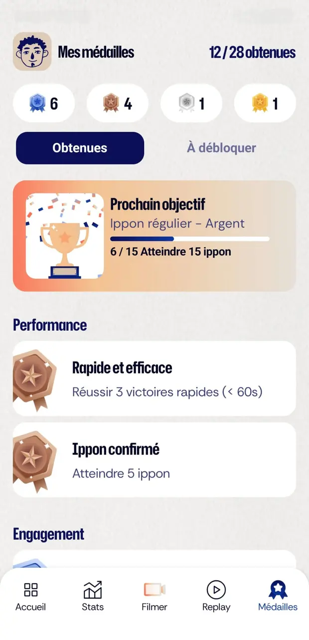 Écran Médailles : médailles obtenues et prochain objectif